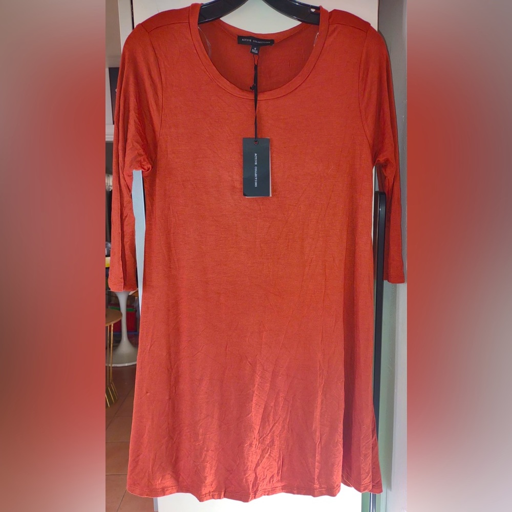 Active Clothing long shirt. Brand new with tag. Size S.